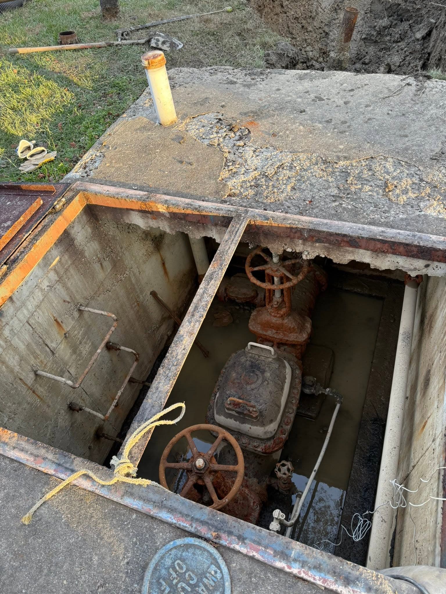 Backflow preventer valve vault serviced by Newman's Plumbing near Deep Creek, Chesapeake, VA