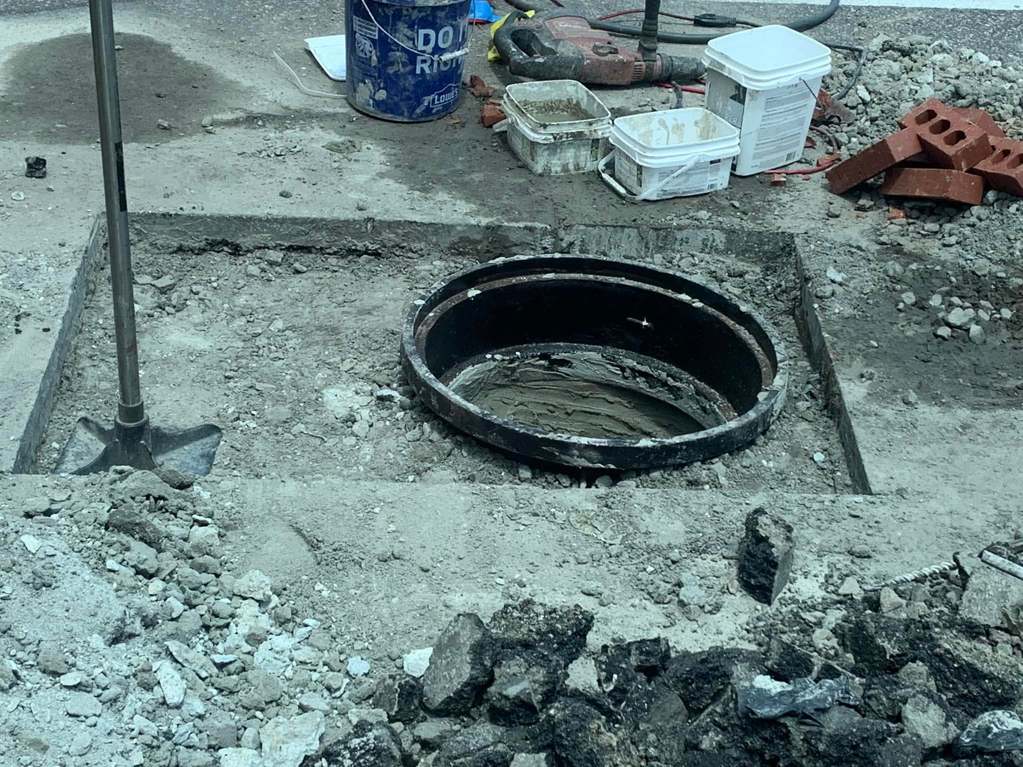 Sewer line cleanout access point excavated for trenchless pipe repair in Portsmouth VA — Newman's Plumbing Service & Repair